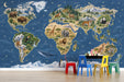 A cozy nursery room featuring the world map wallpaper as an educational accent wall behind a wooden crib.
