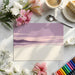 Abstract horizon mural used in a sophisticated modern living room with neutral decor.