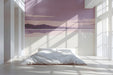 Lavender landscape mural installed on a feature wall in a tranquil minimalist bedroom.