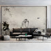 A minimalist living room wall featuring a lemur mural behind a simple headboard.