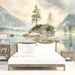 The watercolor nature mural covering a bedroom wall, paired with soft neutral sofas and indoor plants.