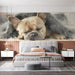 A small bedroom corner featuring a peaceful dog watercolor mural on the main wall.