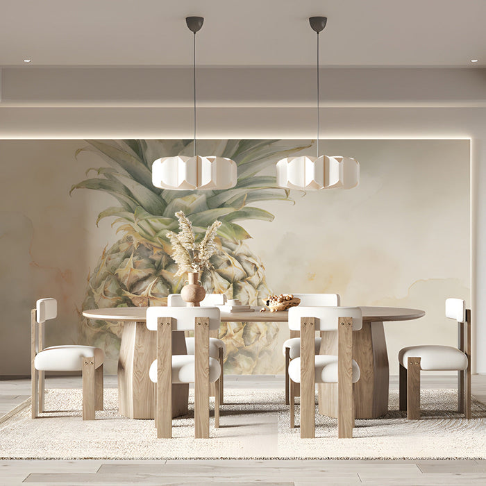 A bright, airy kitchen dining area featuring a large-scale watercolor pineapple mural on the accent wall.