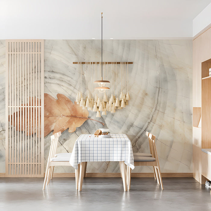 A bright dining room interior with a soft autumn oak leaf mural providing a minimalist nature-inspired backdrop.