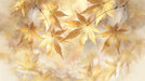 A soft-focus mural of golden maple leaves in shades of ochre and cream with a painterly impressionistic style.