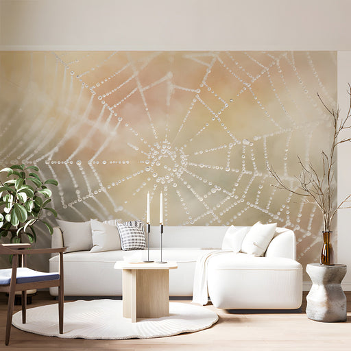 A minimalist living room with the dewy web wallpaper acting as a subtle artistic backdrop for a wooden bookshelf.