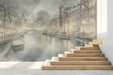 Amsterdam canal mural installed on the feature wall of a modern living room with grey velvet furniture.