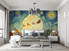A cozy bedroom decorated with a whimsical winter village wallpaper mural on the main wall.