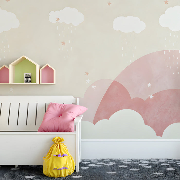 A cozy playroom for kids with a dreamy cloud and star pattern mural wallpaper.