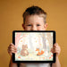 Playroom wall decorated with a soft-toned forest friend mural and wooden toy storage