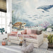 Underwater mural installed on a large wall in a serene bedroom with natural light