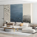 Living room interior showing a artistic school of fish mural with minimalist furniture