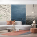 Modern living room featuring an ink wash fish mural on the main accent wall