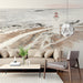 Living room wall featuring a serene lighthouse mural as a calming feature wall