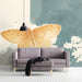 Butterfly and floral wall mural shown in a bright living room with minimalist shelving and green plants