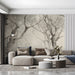 Misty forest ink wash mural installed in a minimalist living room with neutral bedding.