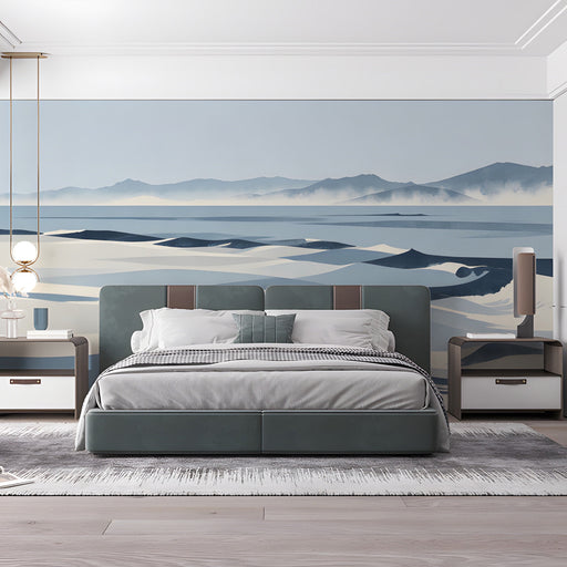The coastal mural installed in a light-filled bedroom with a linen bed and wooden bedside tables.