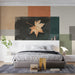 Contemporary bedroom wall with an autumnal color block mural providing a sophisticated backdrop for a sleek table.