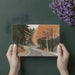 A home office workspace featuring the forest road mural as an inspiring wall backdrop.