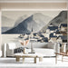 Living room interior with an artistic mountain lakeside scene mural as a sophisticated backdrop.