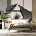 Bedroom walls decorated with a neutral, artistic plant motif mural.
