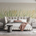 Soft botanical wallpaper design in a serene bedroom space with minimal desk setup.