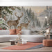 A cozy living room featuring a snowy forest mural on the main wall with minimalist furniture.