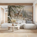 A cozy living room featuring a snowy winter forest wallpaper behind the headboard.