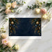 A cozy entryway featuring a sophisticated navy and gold holiday mural with hanging ornament details.