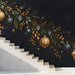Elegant seasonal wall mural installed in a library with metallic accents.