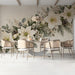 Winter floral mural installed in a dining room above a wooden table