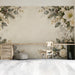 Study wall featuring a winter botanical mural framing a cozy upholstered headboard