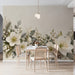 Elegant winter floral wall covering in a serene dining room with natural light and white textiles.