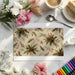 A festive dining room wall decorated with the winter botanical mural for a holiday meal setting.