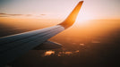 Airplane Wing at Sunset Living Room Mural Wallpaper | Adventurous Serene Decoration