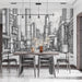 Dining room with a table and chairs, featuring a cityscape design on the wall.