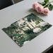 Placemat with nature design on a table with pink roses