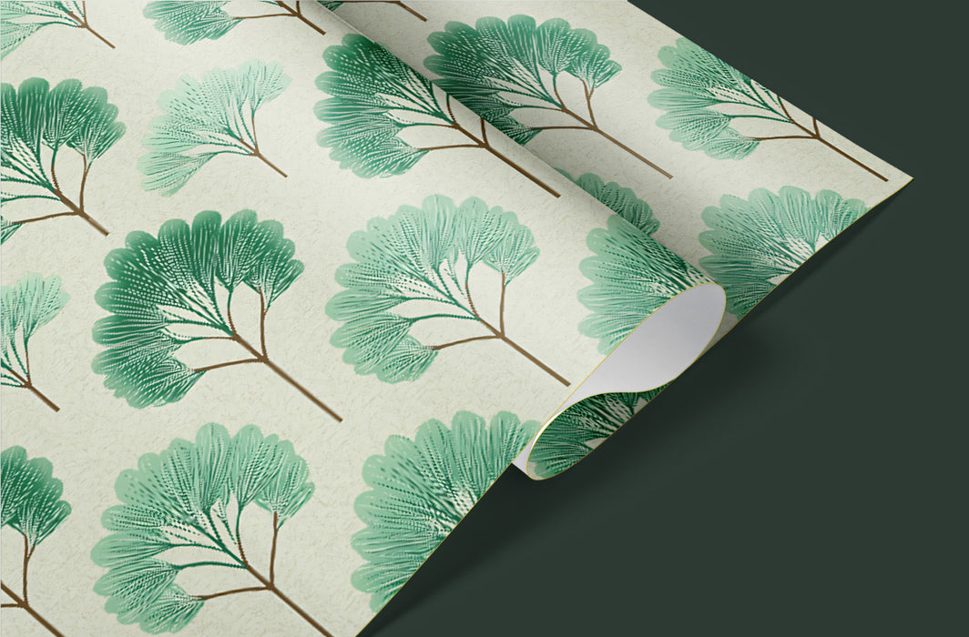 Green leaf patterned paper on a dark background