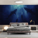 Bedroom with shark and diver wall mural on the wall