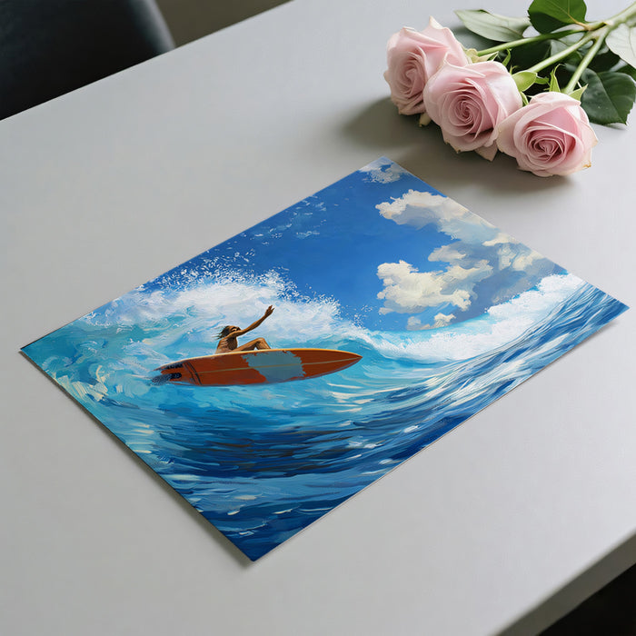 Art print of a person on a surfboard with a blue sky and clouds, placed on a table with pink roses.
