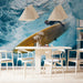 Dining room with a large wall mural of a surfer on a wave.