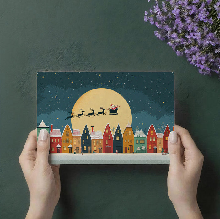 Folk Art Christmas Village Night Mural Wallpaper | Santa Sleigh, Geometric Houses, Bright Moon Silhouette